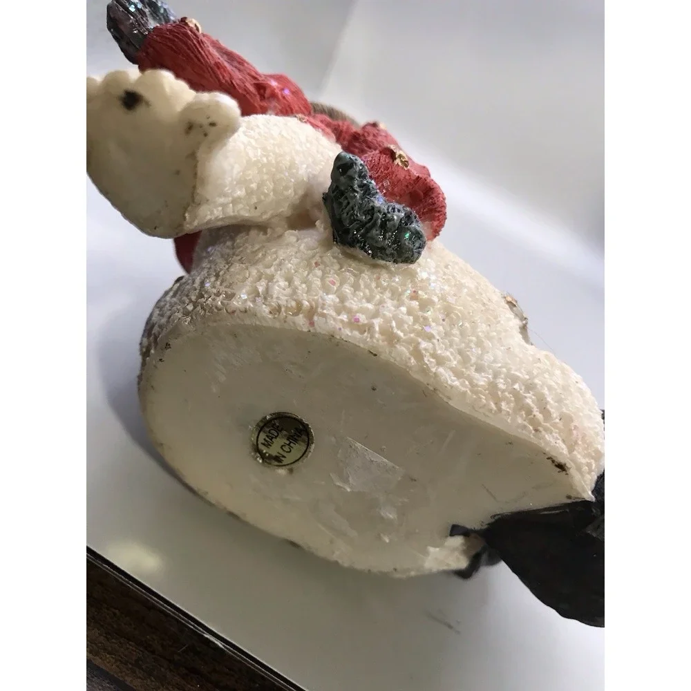 Resin Snowman Kicked‎ Back With A Bird On His Foot